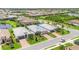 Aerial view of the house and community, showcasing its location near a lake and green spaces at 17910 Waterville Pl, Lakewood Ranch, FL 34202