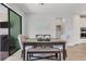 Dining room with modern chandelier at 17910 Waterville Pl, Lakewood Ranch, FL 34202