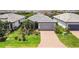 Charming home with a well-manicured lawn and beautiful landscaping at 17910 Waterville Pl, Lakewood Ranch, FL 34202