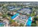 Overhead view of lawn bowling courts near the tennis courts with shaded seating and landscaping at 17910 Waterville Pl, Lakewood Ranch, FL 34202