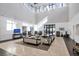 Elegant lobby area with high ceilings, stylish seating arrangements, and abundant natural light at 17910 Waterville Pl, Lakewood Ranch, FL 34202