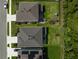 Aerial view highlighting well-maintained homes, spacious lawns, and fenced backyards in a Gathering-friendly neighborhood at 2136 Midnight Pearl Dr, Sarasota, FL 34240