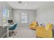 Dedicated home office space with lots of natural light and neutral decor at 2136 Midnight Pearl Dr, Sarasota, FL 34240