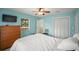 Bright, naturally lit bedroom with ceiling fan, two windows and closet at 2275 Clematis St, Sarasota, FL 34239