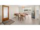 Inviting dining room with table, chairs, and natural light at 2275 Clematis St, Sarasota, FL 34239