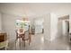 Comfortable dining area featuring neutral walls, wood table and chairs at 2275 Clematis St, Sarasota, FL 34239
