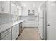 Modern kitchen with white cabinets and stainless steel appliances at 2275 Clematis St, Sarasota, FL 34239