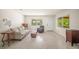 Cozy living room featuring neutral walls, and comfortable seating at 2275 Clematis St, Sarasota, FL 34239