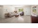 Bright living room featuring neutral walls, and comfortable seating at 2275 Clematis St, Sarasota, FL 34239