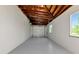 Finished basement featuring painted walls and access to the garage at 320 59Th W St, Bradenton, FL 34209