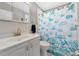 Bathroom featuring a bright white vanity and shower/tub combination at 320 59Th W St, Bradenton, FL 34209