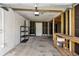 Spacious garage offering ample storage space and potential for workshop or hobby area at 320 59Th W St, Bradenton, FL 34209