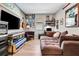 Bonus Room featuring media center, large couch, and an electric keyboard at 3218 Big Sky Way, Bradenton, FL 34211