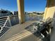 Relaxing balcony with seating and a serene view of the community waterfront at 3418 79Th Street W Cir # 202, Bradenton, FL 34209