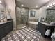 Spacious bathroom with dual vanities, granite countertops, soaking tub, and walk-in shower at 3418 79Th Street W Cir # 202, Bradenton, FL 34209