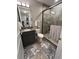 Bathroom features a modern vanity, toilet, and a glass-enclosed shower with tile surround at 3418 79Th Street W Cir # 202, Bradenton, FL 34209