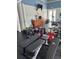 Amenity center fitness area with weight training equipment and machines at 3418 79Th Street W Cir # 202, Bradenton, FL 34209