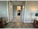 Hallway view leading to walk-in closet with shelving at 3418 79Th Street W Cir # 202, Bradenton, FL 34209