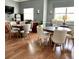 Lobby area with multiple round dining tables and comfortable chairs at 3418 79Th Street W Cir # 202, Bradenton, FL 34209