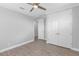 Bedroom with ceiling fan, large closet, and hardwood floors at 3553 Secluded Ct, Sarasota, FL 34240