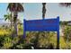 Selby Aquatic Center sign surrounded by lush landscaping for a warm welcome to this amazing community amenity at 3734 Ballantrae Dr # 19D, Sarasota, FL 34238
