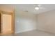 Bright bedroom with a ceiling fan and tile flooring at 3734 Ballantrae Dr # 19D, Sarasota, FL 34238