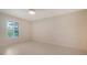Bedroom featuring tile floors, plantation shutters and a ceiling fan at 3734 Ballantrae Dr # 19D, Sarasota, FL 34238
