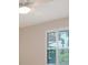 Bedroom featuring plantation shutters and a ceiling fan at 3734 Ballantrae Dr # 19D, Sarasota, FL 34238