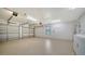 Garage with two garage doors and laundry sink at 3734 Ballantrae Dr # 19D, Sarasota, FL 34238