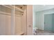 Hallway with closet and bench seating near the front door at 3734 Ballantrae Dr # 19D, Sarasota, FL 34238