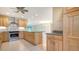 Spacious kitchen features granite countertops, stainless steel appliances, and a large island at 3734 Ballantrae Dr # 19D, Sarasota, FL 34238