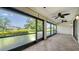 Screened lanai with views of the backyard at 3734 Ballantrae Dr # 19D, Sarasota, FL 34238