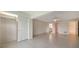 Spacious main bedroom with tile floors, walk-in closet, and ensuite bathroom at 3734 Ballantrae Dr # 19D, Sarasota, FL 34238