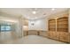 Bright home office with built-in cabinetry and desk at 3734 Ballantrae Dr # 19D, Sarasota, FL 34238