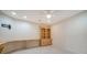 Home office with built-in desk and shelves at 3734 Ballantrae Dr # 19D, Sarasota, FL 34238