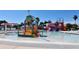 Resort-style community pool featuring a splash area with a water slide, providing endless fun for residents and families at 3734 Ballantrae Dr # 19D, Sarasota, FL 34238