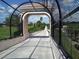A shaded walking path, creating a peaceful environment to relax and enjoy the outdoors at 3734 Ballantrae Dr # 19D, Sarasota, FL 34238