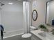 Bright bathroom features a shower over tub, stylish fixtures, and neutral decor at 3703 39Th Street W # 11, Bradenton, FL 34205