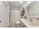 Functional bathroom with a shower/tub combination, vanity, and ample storage at 4057 Crockers Lake Blvd # 15, Sarasota, FL 34238