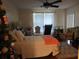 Inviting bedroom with a ceiling fan, natural light, and a cozy atmosphere for relaxation at 4057 Crockers Lake Blvd # 15, Sarasota, FL 34238