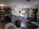 Combination living space showcasing the kitchen, dining area, and living room at 4057 Crockers Lake Blvd # 15, Sarasota, FL 34238