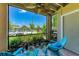 Relaxing screened patio with garden view and comfortable seating at 4057 Crockers Lake Blvd # 15, Sarasota, FL 34238