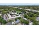 Overhead view of the complex with green space, conveniently located near a highway and other residential areas at 412 E Amelia Ave, Tampa, FL 33602