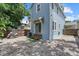 Charming backyard with a private brick patio and unique exterior at 412 E Amelia Ave, Tampa, FL 33602