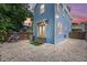 Charming backyard with a private brick patio and unique exterior at 412 E Amelia Ave, Tampa, FL 33602