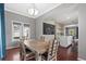Inviting dining room boasts a rustic wooden table, chalkboard wall, and ample natural light at 412 E Amelia Ave, Tampa, FL 33602