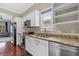 Bright kitchen features stainless steel appliances, granite countertops, and ample cabinet space at 412 E Amelia Ave, Tampa, FL 33602