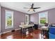 Home office featuring hardwood floors, natural light, and ample workspace at 412 E Amelia Ave, Tampa, FL 33602