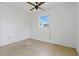 Bedroom with a window, and ceiling fan showcasing the potential of the space at 417 Glen Oak Rd, Venice, FL 34293