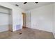 Bedroom with a window, ceiling fan, and an open closet, along with tile flooring in the room at 417 Glen Oak Rd, Venice, FL 34293